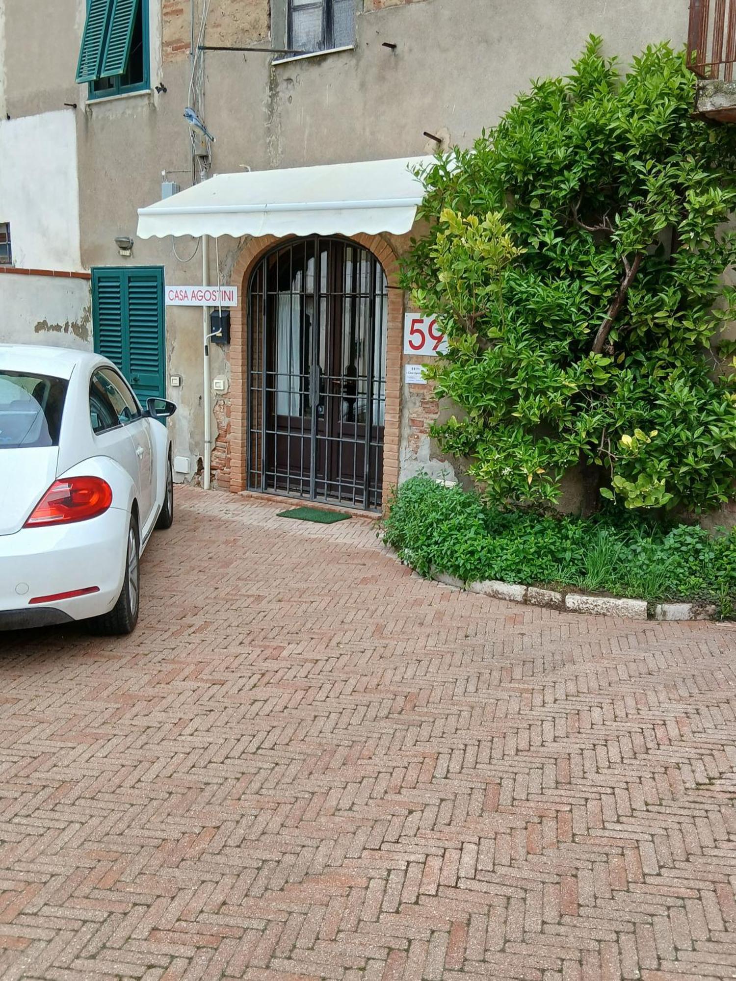Casa Agostini Appartement Lari Buitenkant foto